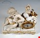  مجسمه ساعت دست ساز دکوری چینی آنتیک قدیمی مایسن آلمان Meissener Uhrengehäuse Lese Amor Allegorie der Schönen Künste von Acier um 1850